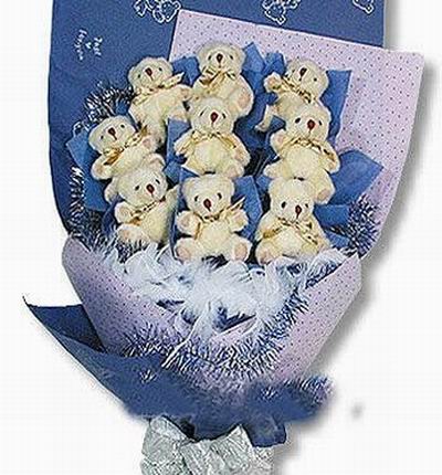 9 mini 10cm teddy bear bouquet with feather fillers.