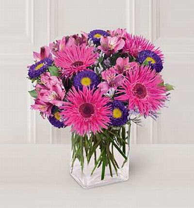 Spider Gerbera daisies and purple Matusmoto asters and alstroemeria.